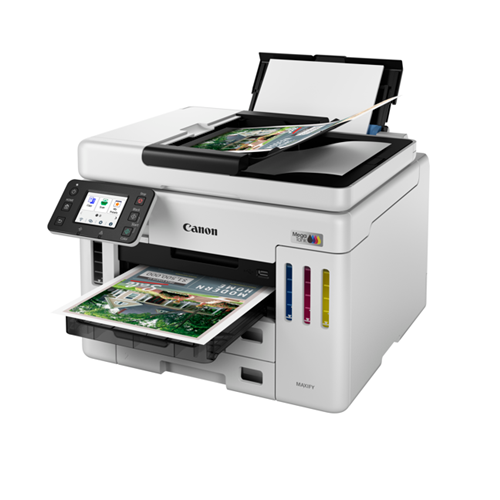Canon printer with scanning bed and paper input tray on a white background